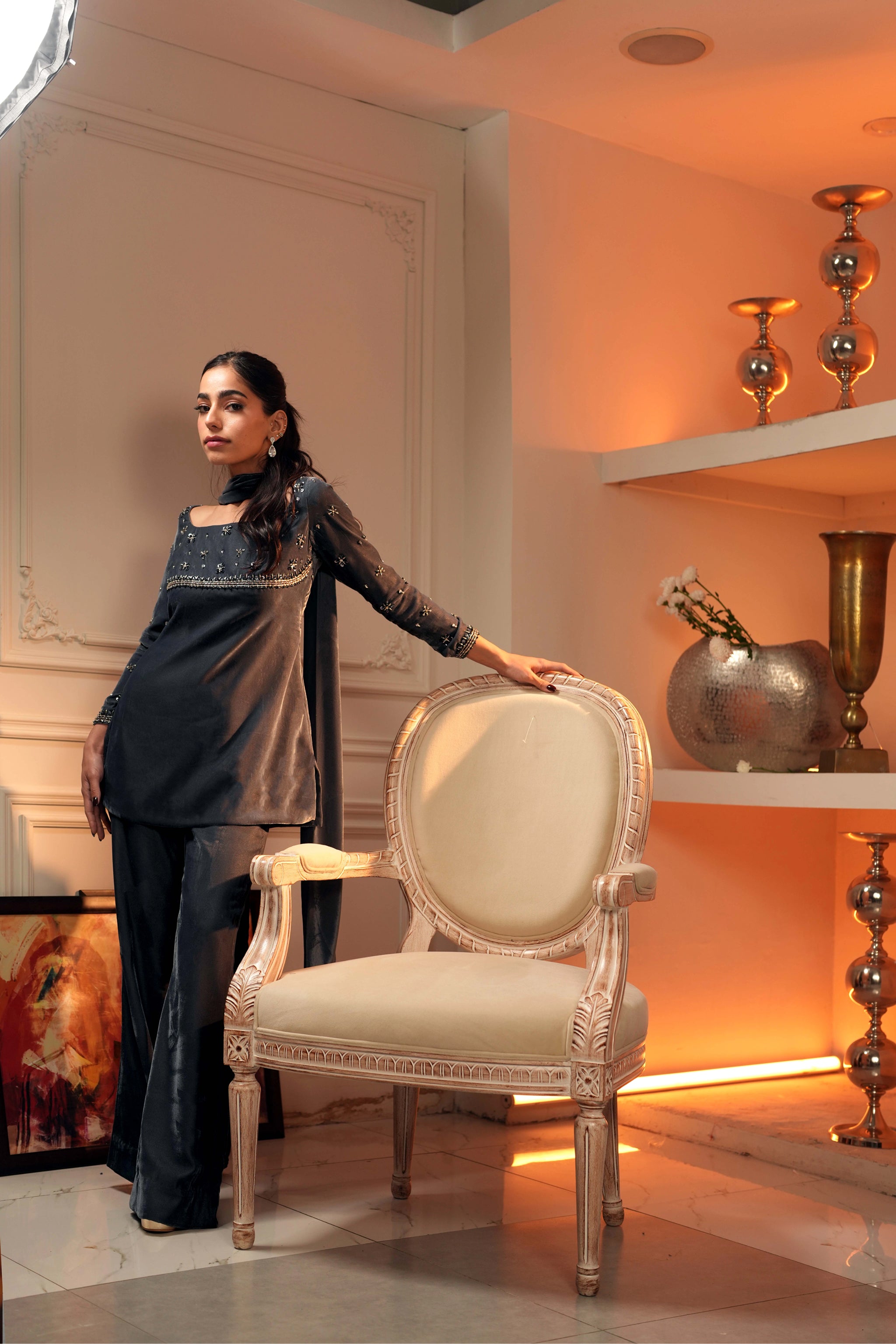 Front view of a grey-blue bridal wear ensemble in embroidered velvet, short shirt with metallic beadwork and zari